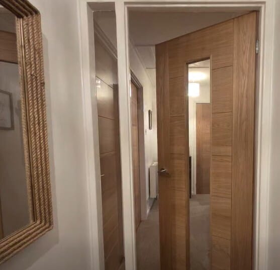 1981 x 762 x 35mm (30") Modern 7 Panel Oak Clear Glazed - Prefinished Internal Doors